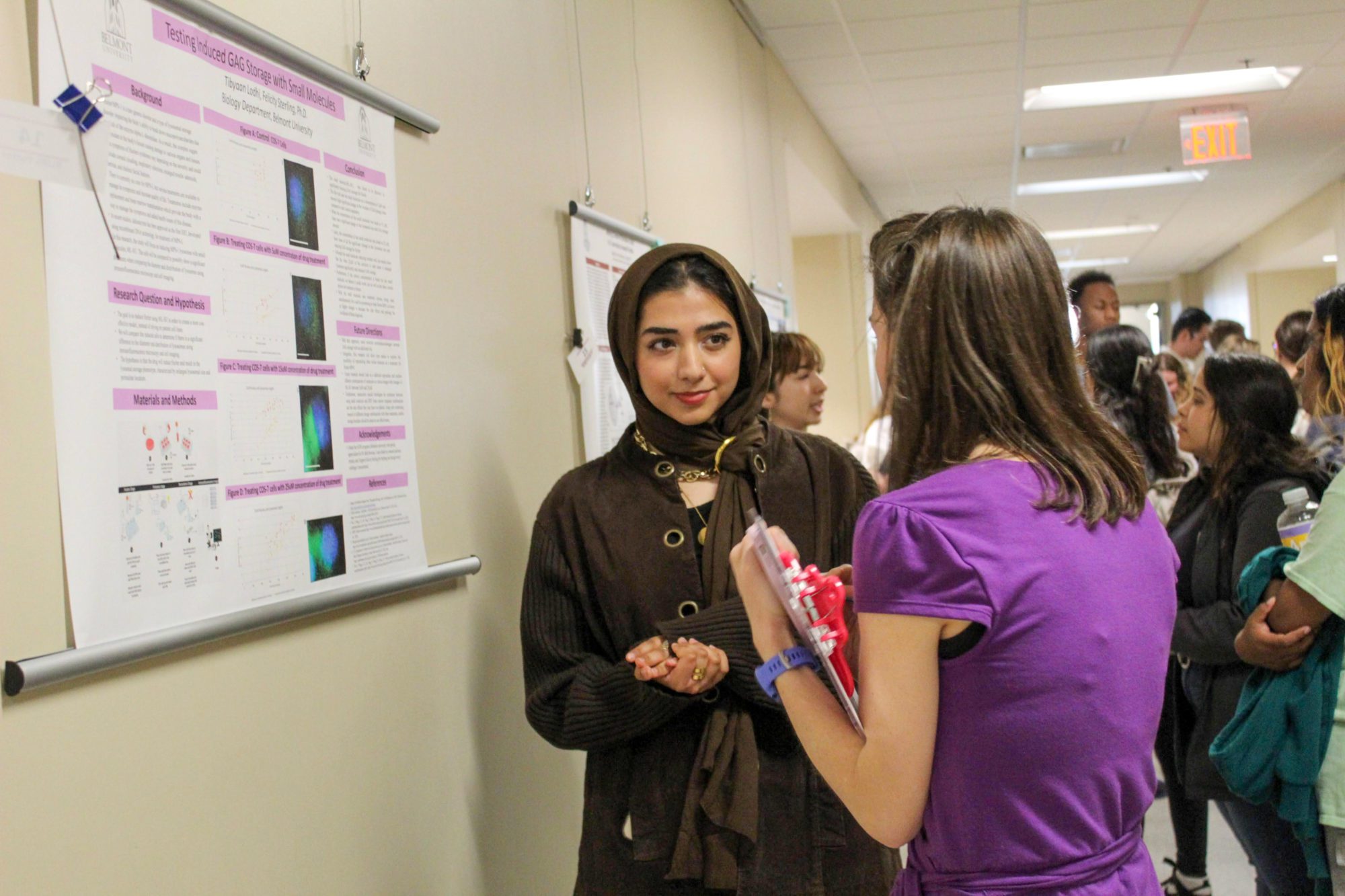 Student presenting poster